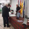 A visitor at the New Brunswick Scottish Cultural Association display. 