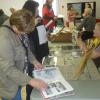 Visitors to the old photo display of the Fredericton North Heritage North Association. 