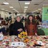 Greeters and FNHA members Jean Mabie and Jill Hargrove at the Heritage Fair welcome table. 