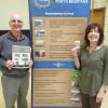 Billy Saunders, former baseball player, coach and historian accepting thanks from FNHA member Jill Hargrove. The May 2015 speaker spoke on the history of the Marysville Royals Field. 