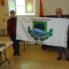 January 2018 speaker Robert McNeil with FNHA member Diana Moore and the new FNHA flag. 