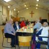 Another view of FNHA members enjoying seasonal refreshments at the Christmas Party.