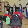 Members of the Doucet Family Singers performing Christmas songs.