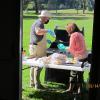 FNHA members Eric Megarity and Jill Hargrove preparing food at the 2021 BBQ. 